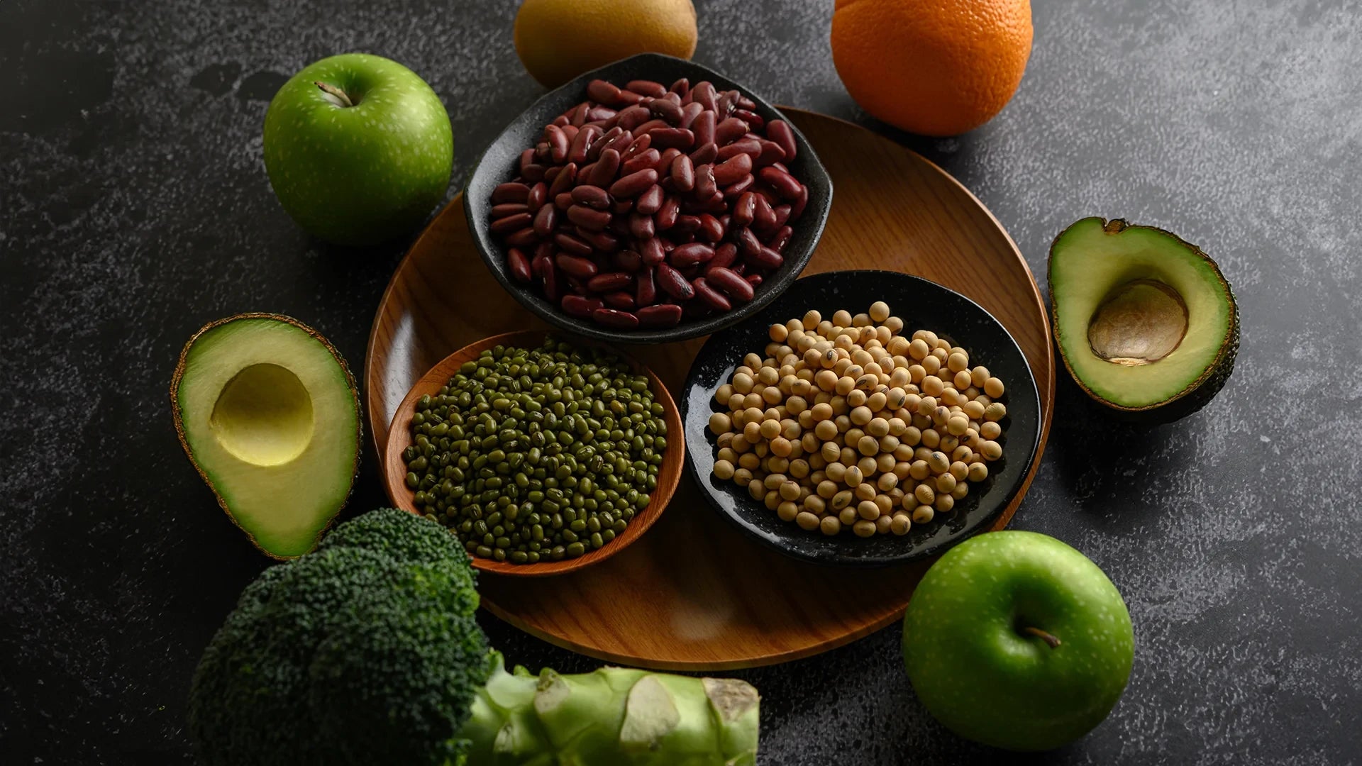 Plant protein sources including legumes, nuts, seeds and vegetables for vegan nutrition 
