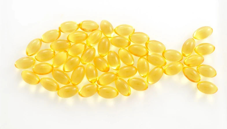 A collection of halal certified softgels and supplements on a clean background, illustrating Islamic compliant health products. 